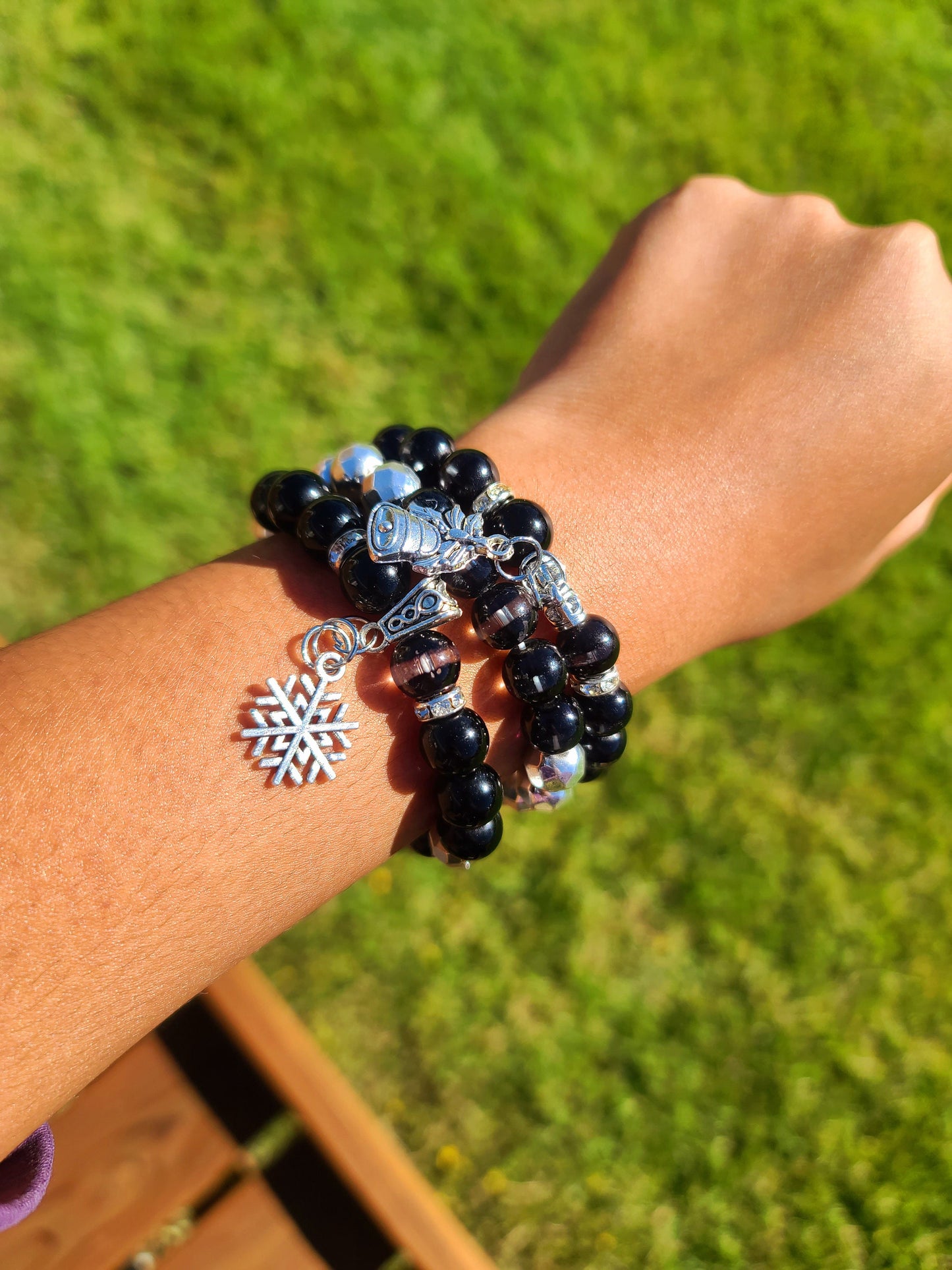 Beaded Bracelet Set Black Cat Eye Beads with Christmas Silver Bells and Snowflake Charms Gift For Her