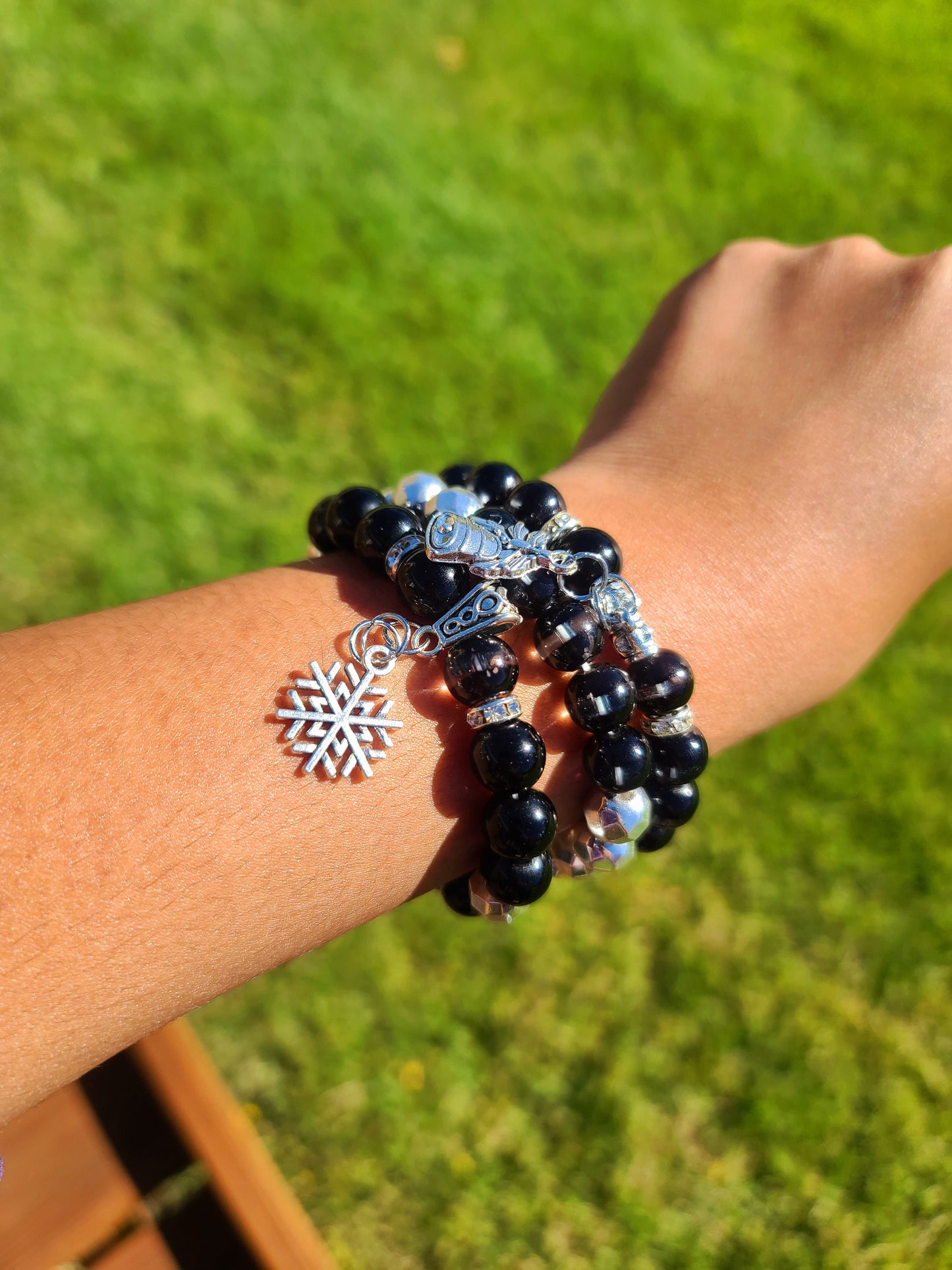 Beaded Bracelet Set Black Cat Eye Beads with Christmas Silver Bells and Snowflake Charms Gift For Her