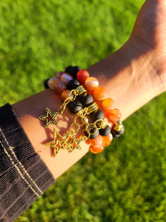 Beaded Bracelet Set Orange Banded Round Agate, Matte Black Beads with Gold Star Charms Gift For Her